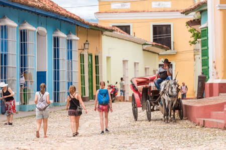 TRINIDAD, CUBA - MAY 16, 2017: People in the city square. Copy space for textのeditorial素材