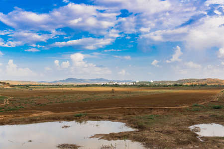 View of the indian rural landscape, Puttaparthi, Andhra Pradesh, India. Copy space for text