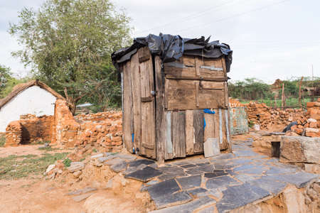 View of rural indian toilet, Puttaparthi, Andhra Pradesh, India. Copy space for textの写真素材