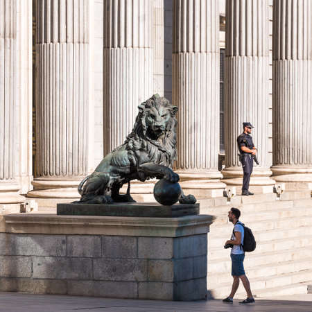 MADRID, SPAIN - SEPTEMBER 26, 2017: Statue of a lion Congress of Deputies. Copy space for textのeditorial素材