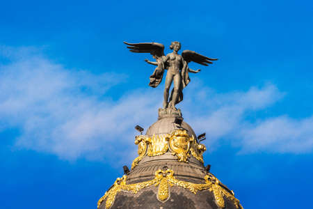 MADRID, SPAIN - SEPTEMBER 26, 2017: A view of the sculpture of an angel on the Metropolis building. Copy space for textのeditorial素材