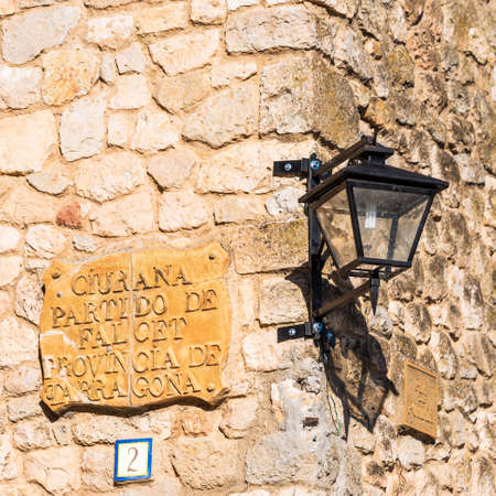 SIURANA DE PRADES, SPAIN - OCTOBER 5, 2017: Nameplate on the facade of the building. Close-upのeditorial素材