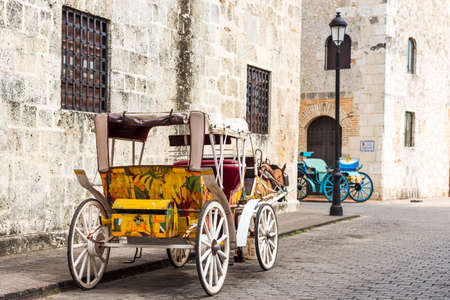 Retro carriage with a horse on a city street in Santo Domingo, Dominican Republic.の写真素材
