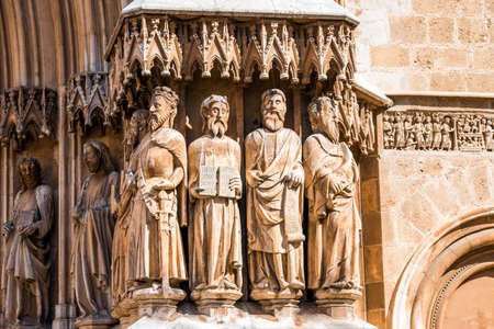 TARRAGONA, SPAIN - OCTOBER 4, 2017: Cathedral (Catholic cathedral). Sculptures on the facade of the building. Close-upの写真素材