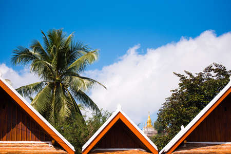 View of the roofs of buddhist buildings, Louangphabang, Laos.の写真素材