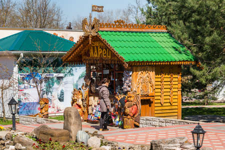 GORYACHY KLYUCH, RUSSIA - MARCH 30, 2017: View of the souvenir shop in the city park. Copy space for...