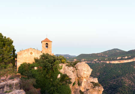 View of the Romanesque church of Santa Maria de Siurana, in Siurana, Tarragona, Spain. Copy space for textの写真素材