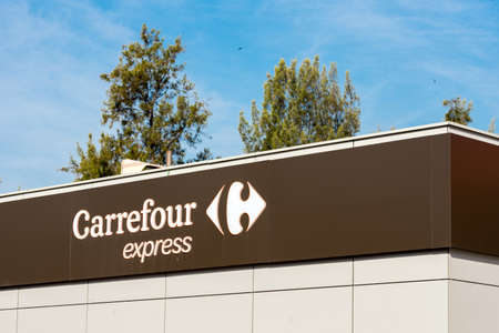 PRATDIP, TARRAGONA, SPAIN - APRIL 20, 2017: Facade of the building Carrefour express. Close-upのeditorial素材