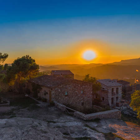 View of the mountain landscape at sunset in Siurana de Prades, Tarragona, Spain. Copy space for textの写真素材