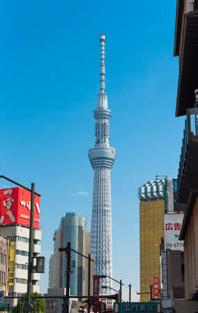 TOKYO, JAPAN - OCTOBER 31, 2017: View of the television tower against the blue sky. Vertical. Copy space for textのeditorial素材