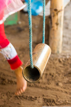 Bamboo swing in Luang Prabang, Laos. Close-up. Verticalの写真素材