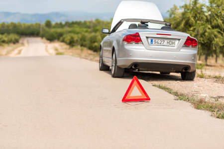The Spanish landscape. The car broke down on the road, Tarragona, Catalunya, Spain. Copy space for textのeditorial素材