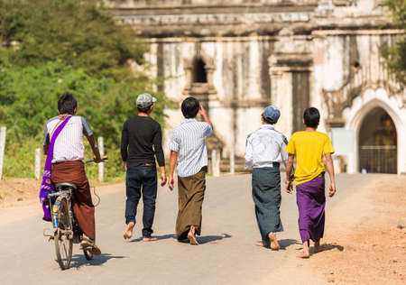 Group of a man walking on the road in Bagan, Myanmar. Copy space for textのeditorial素材