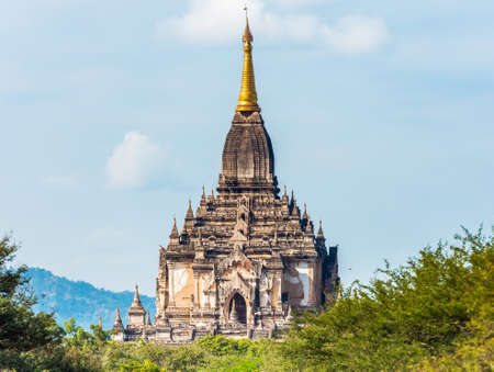 View of the facade of the building of the Shwegugyi temple in Bagan, Myanmar. Copy space for textの写真素材