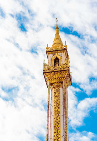 View of a pagoda with a Buddha statue in Bagan, Myanmar. Copy space for text. Verticalの写真素材