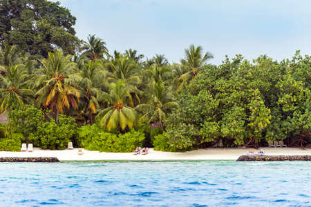 MALE, MALDIVES - NOVEMBER, 27, 2016: View of the sandy beach, Indian ocean. Copy space for text.のeditorial素材