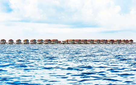 Water villas on tropical caribbean island, Maldives. Copy space for text.のeditorial素材