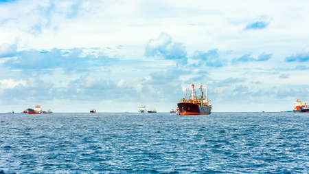 Merchant ships near the shore, Male, Maldives. Copy space for text
