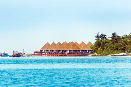 Water villas on tropical caribbean island, Maldives. Copy space for text.のeditorial素材