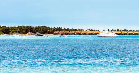 Water villas on tropical caribbean island, Maldives. Copy space for text.のeditorial素材