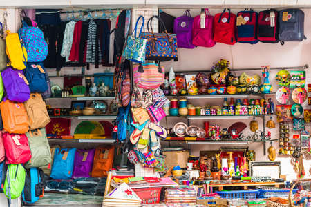 HANOI, VIETNAM - DECEMBER 16, 2016: Sale of bags and souvenirs in the local market.のeditorial素材