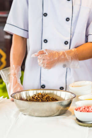 Vietnamese salad in a bowl of stainless steel, Hanoi, Vietnam. Verticalの写真素材