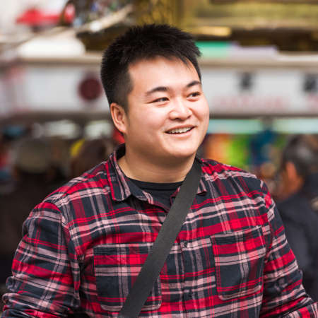 TOKYO, JAPAN - OCTOBER 31, 2017: Portrait of a japanese man on a city street. Close-upのeditorial素材