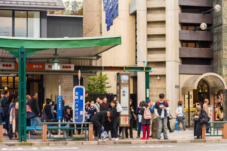 KYOTO, JAPAN - NOVEMBER 7, 2017: A group of people at a city stop. Copy space for textのeditorial素材