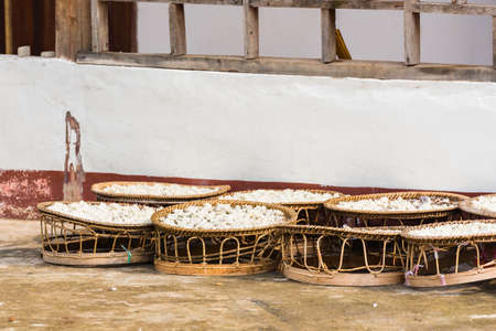 White rice in large baskets outdoors, Luang Prabang, Laos. Copy space for textの写真素材