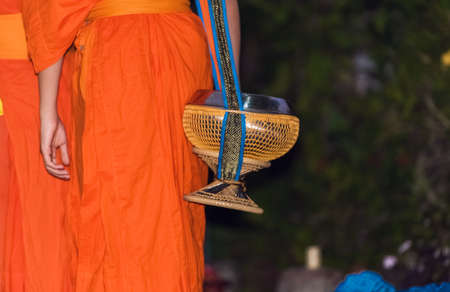 Feeding the monks. The ritual is called Tak Bat, Luang Prabang, Laos. Close-upの写真素材