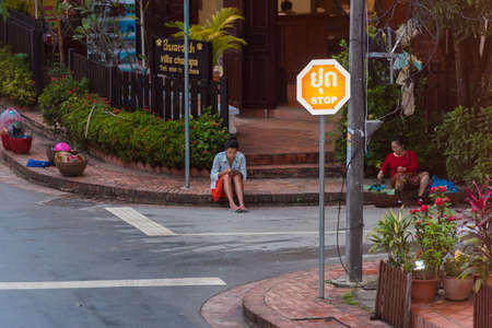LUANG PRABANG, LAOS - JANUARY 11, 2017: View of the evening city street. Copy space for textのeditorial素材