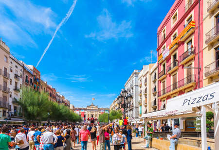 TARRAGONA, SPAIN - SEPTEMBER 17, 2017: Holiday of Santa Tecla, a crowd of people in the square. Copy space for textのeditorial素材