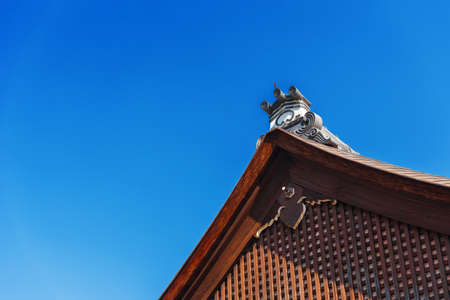 View of the carved wooden roof of the building, Kyoto, Japan.の写真素材
