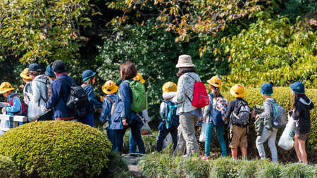 TOKYO, JAPAN - OCTOBER 31, 2017: A group of children in Shinjuku parkのeditorial素材
