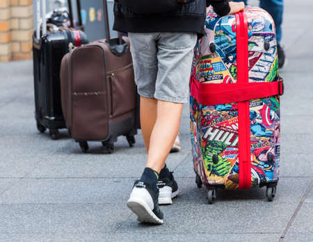 TOKYO, JAPAN - NOVEMBER 7, 2017: Suitcase with illustrations of Marvel. Copy space for textのeditorial素材