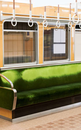 Green seats in the subway car, Kyoto in Japan. Copy space for text. Verticalの写真素材
