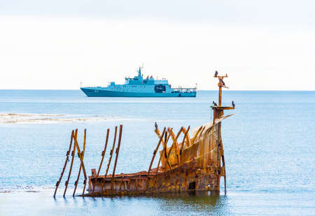 Rusty ship on the lake shore, Punta Arena, Chile. Copy space for textの写真素材