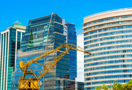 BUENOS AIRES, ARGENTINA - DECEMBER 25, 2017: View of a construction crane against a building backgroundのeditorial素材