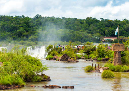 BRAZIL, ARGENTINA - DECEMBER 29, 2017: View of the waterfall on the Iguazu river. Copy space for textのeditorial素材