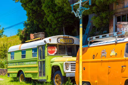 PUERTO VAGAS, CHILE - JANUARY 10, 2018: Bright retro busesのeditorial素材