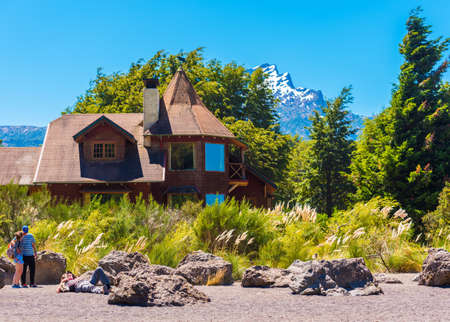 PATAGONIA, CHILE - JANUARY 4, 2018: Wooden building in the background of the mountains, South America. Copy space for textのeditorial素材