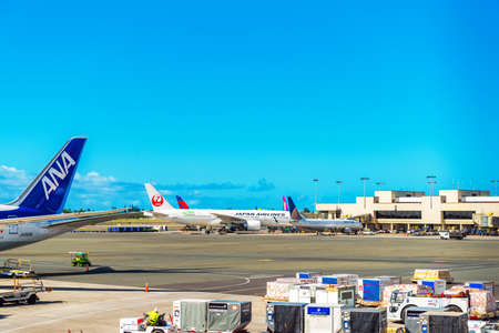 HONOLULU, HAWAII - FEBRUARY 16, 2018: View of the planes at the airport. Copy space for textのeditorial素材