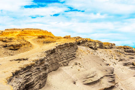 View of the rocks on the beach Papakolea (green sand beach), Hawaii, USAの写真素材