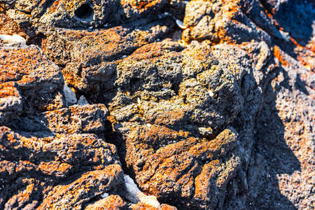 View of the rocks on the beach Papakolea (green sand beach), Hawaii, USA. With selective focusの写真素材
