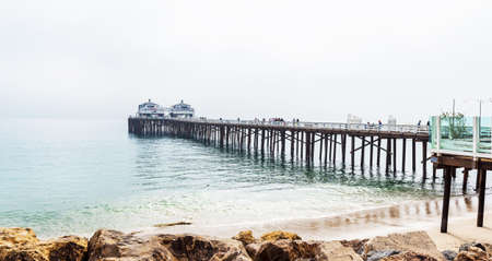 Malibu pier in Southern California, Pacific Coast, USA. View on the Pacific Ocean. Copy space for textの写真素材