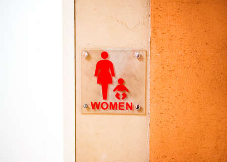 Toilet icon, symbol of woman and child, Tokyo, Japan. With selective focusの写真素材