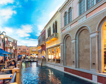 LAS VEGAS, USA - JANUARY 31, 2018: Tourists visting the famous Venician hotel and indoor canals with gondolas in Las Vegas