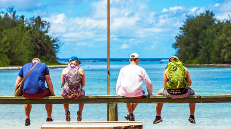 COOK ISLAND, SOUTH PACIFIC - SEPTEMBER 30, 2018: A group of people. With selective focus. Back viewのeditorial素材