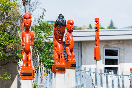 ROTORUA, NEW ZEALAND - OCTOBER 10, 2018: Traditional Maori Carved Sculptures. With selective focusのeditorial素材