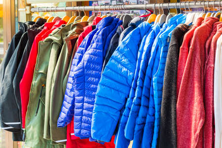 Pullovers hang on a hanger in the store, New Zealand. With selective focusの写真素材